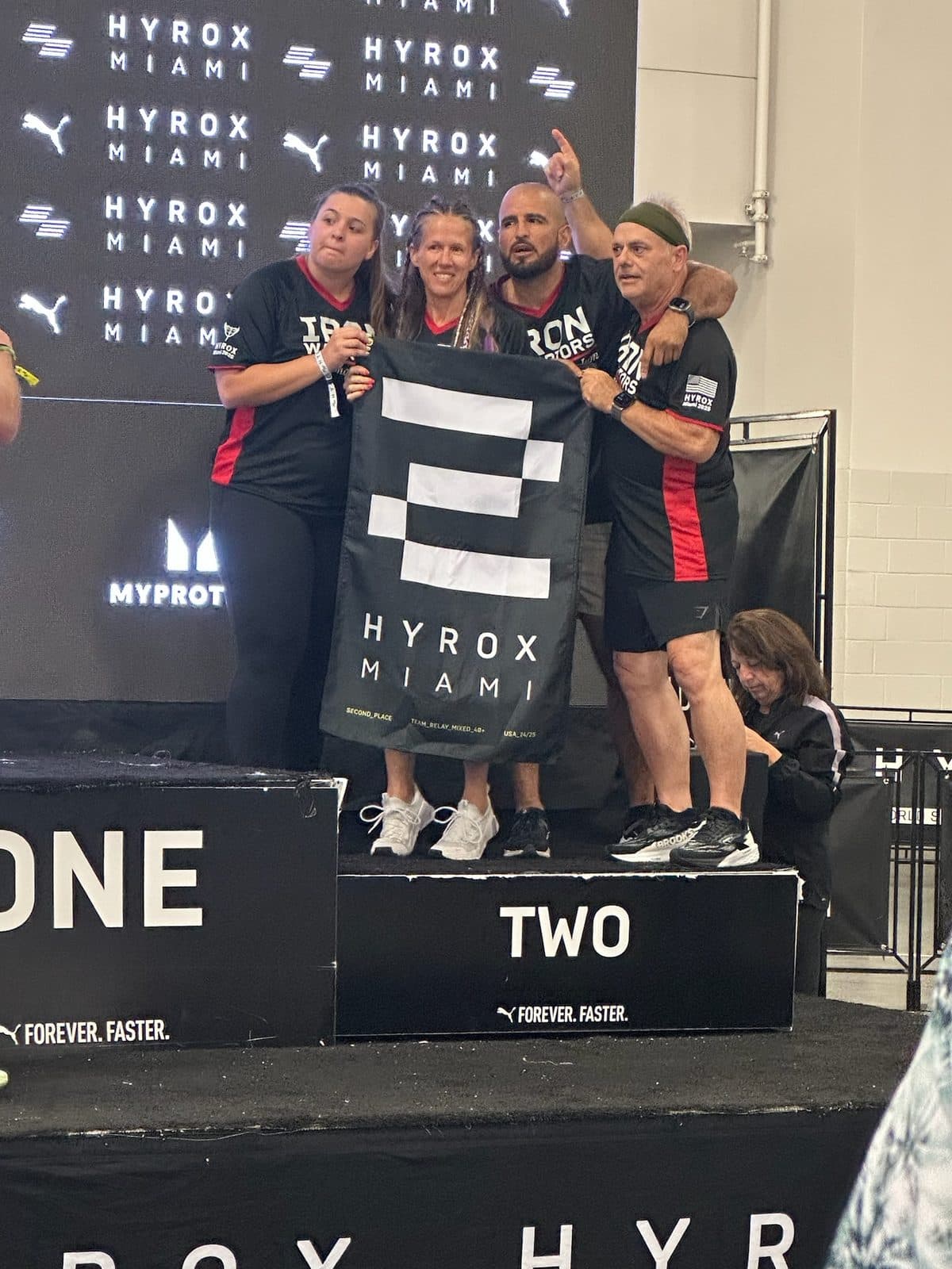 The founder and his team on the Hyrox Miami podium